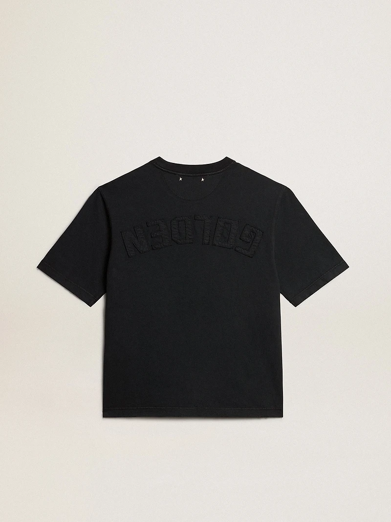 T-shirt washed black with reverse logo on the back
