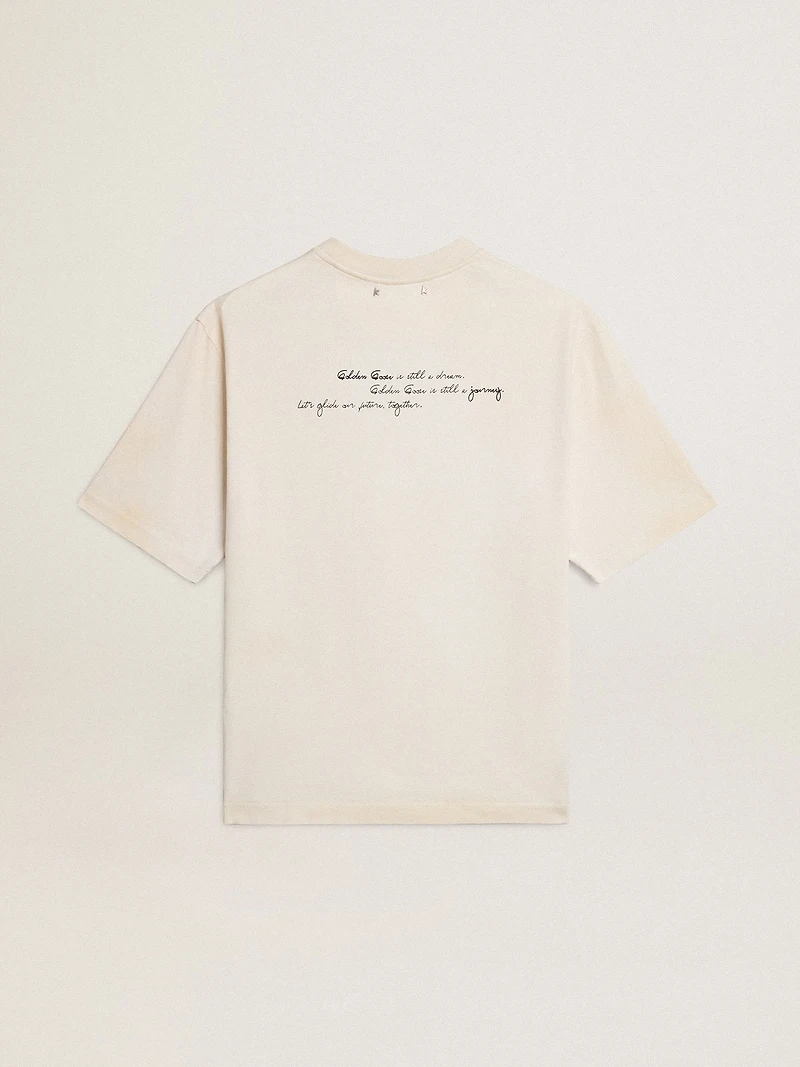Worn-white unisex T-shirt with printed lettering