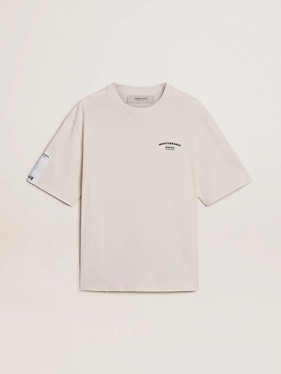 White unisex T-shirt with Mediterranean print and Pescheria Golden patch on the sleeve