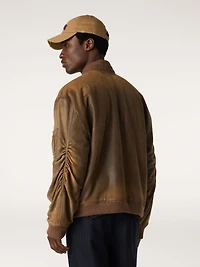 Brown leather biker jacket with a lived-in effect