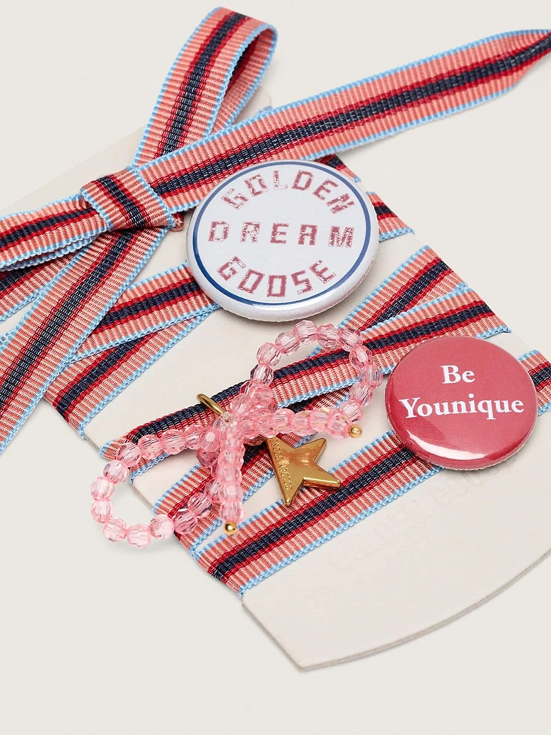 Skins "Playful" colored striped laces with charm and pins