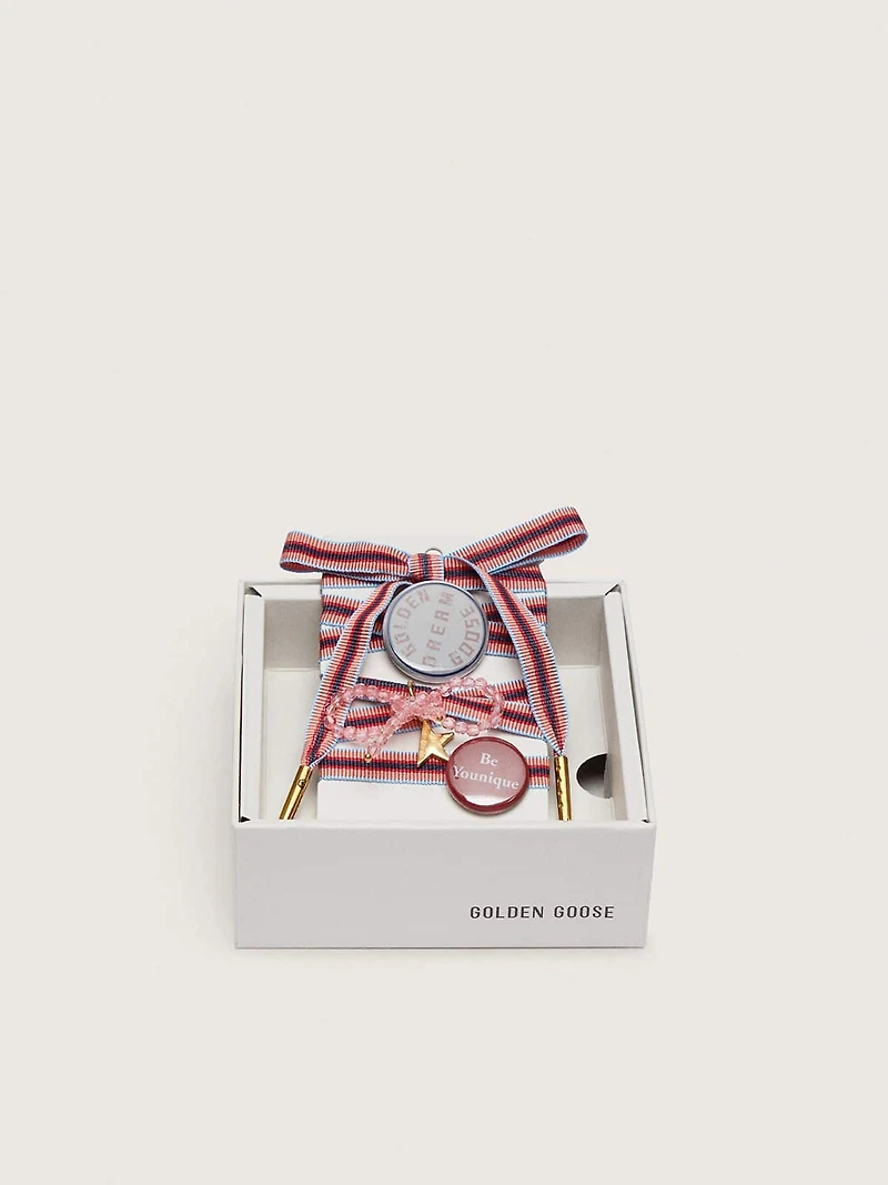 Skins "Playful" colored striped laces with charm and pins