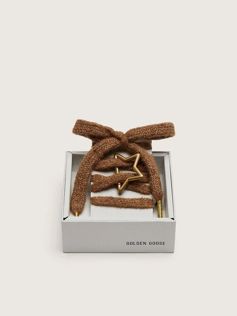 Skins "Playful" brown-colored wool laces with Golden star-shaped snap hook