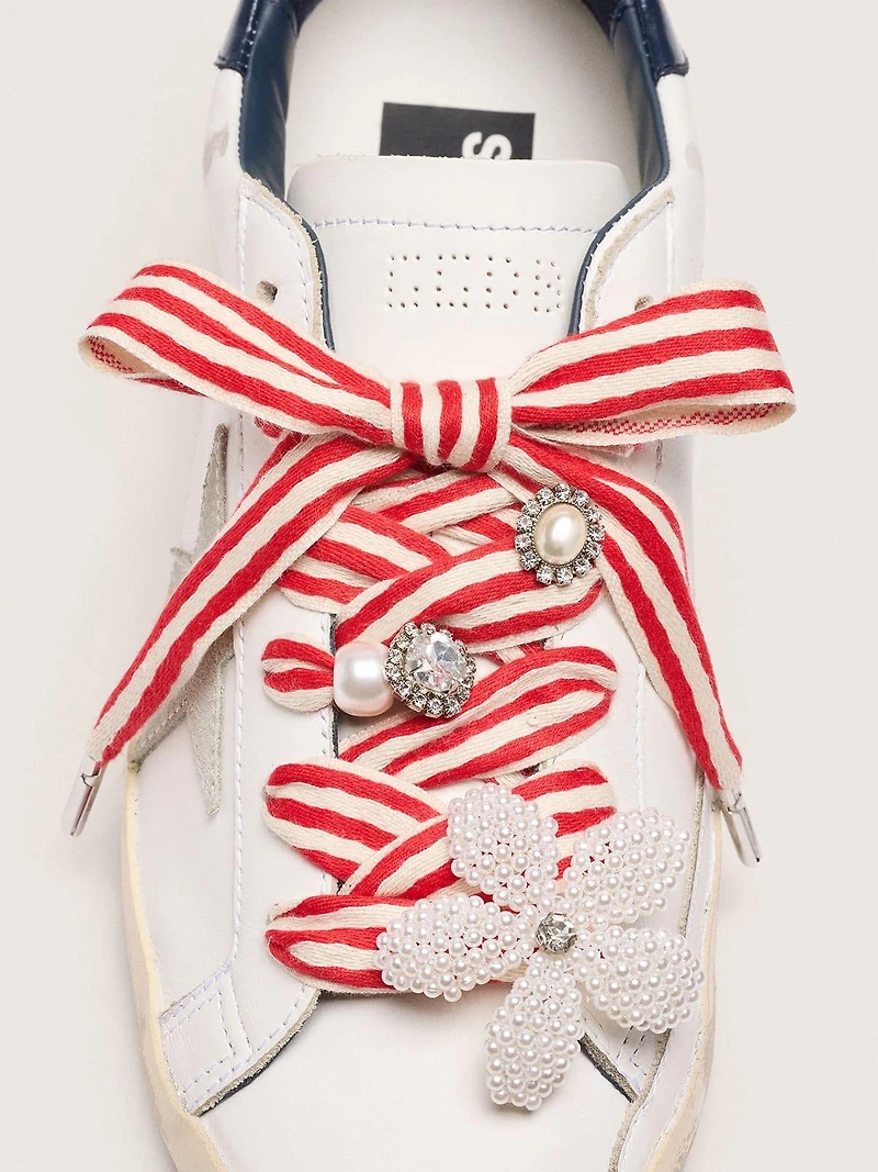 Skin "Playful" red and beige striped laces with appliqué charms