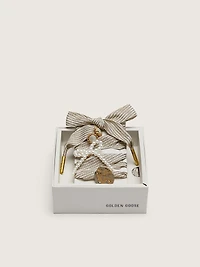 Skins "Sparkling" white and gold striped laces embellished with charms