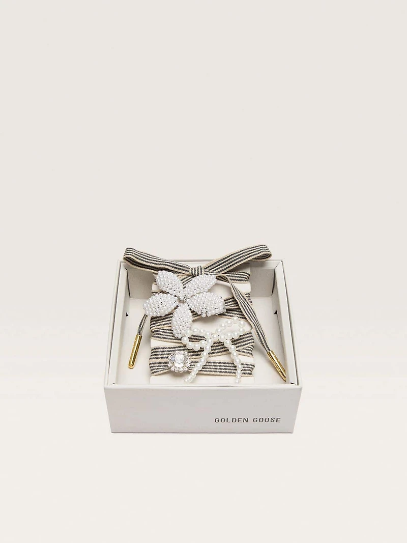 Skins black and beige striped laces with beaded and sparkling charms