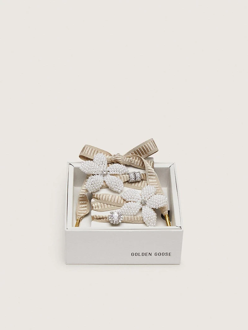 Skins "Sparkling" beige embroidered laces with beaded charms and crystal charms