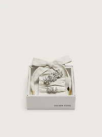 Skins "Sparkling" cream and silver herringbone laces embellished with two charms