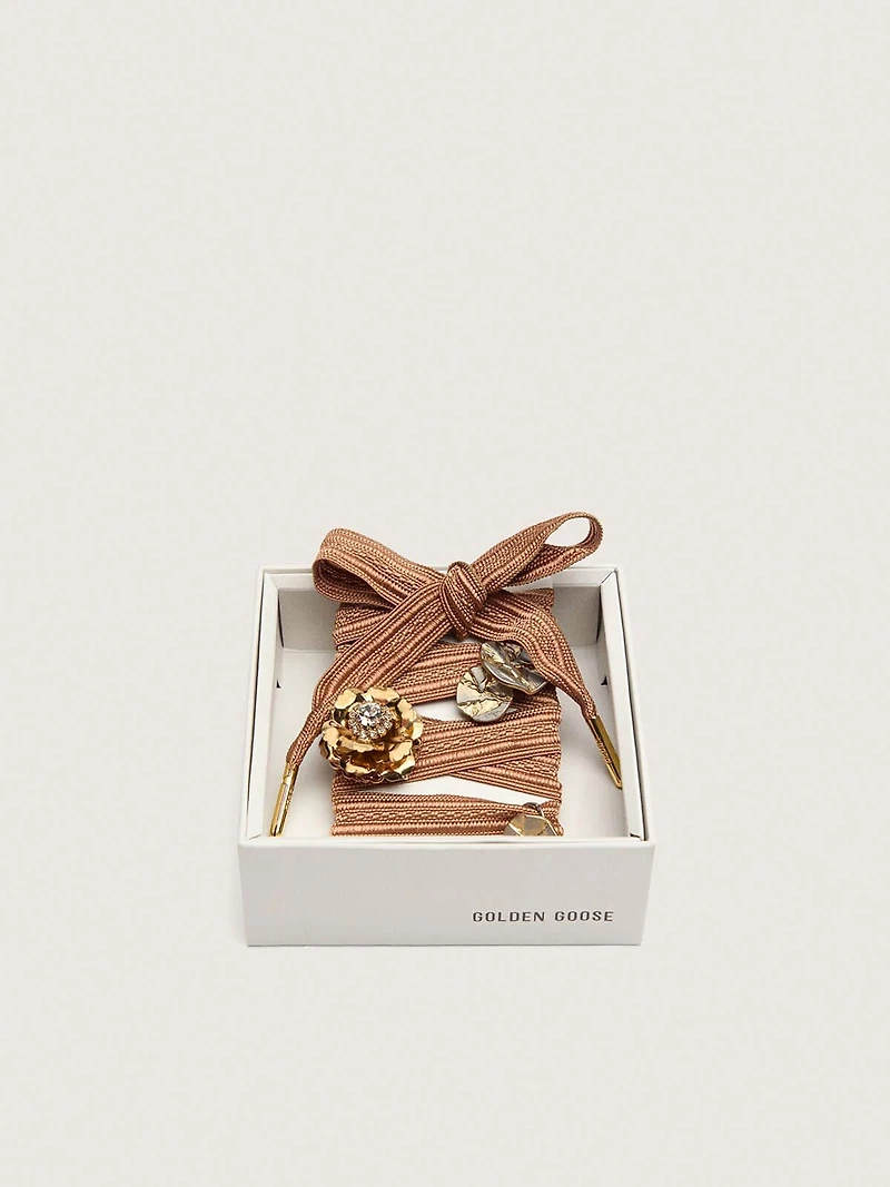 Skins burgundy and peach embroidered laces embellished with charms