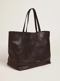 Pasadena Bag in black hammered leather with gold logo on the front