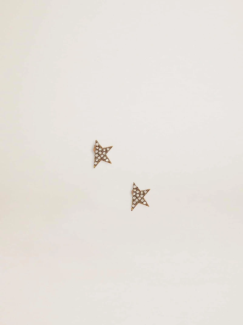 Women's stud earrings in antique gold color with crystals