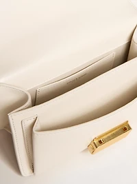 Small Venezia Bag in butter-colored boarded leather with braided scarf and double charm