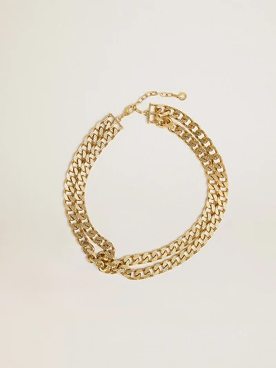 Antique gold-colored braided chain necklace with star-shaped clasp