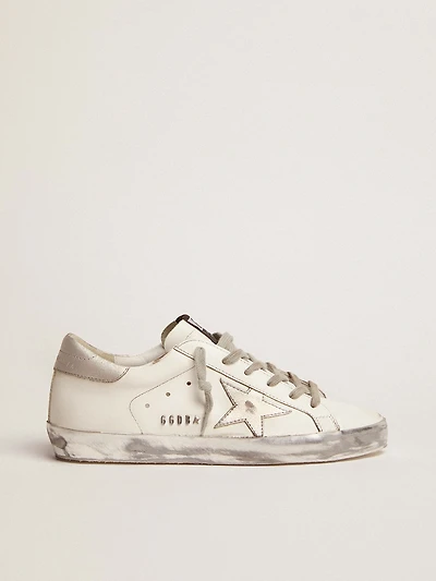 Women's Super-Star with silver sparkle foxing and metal stud lettering