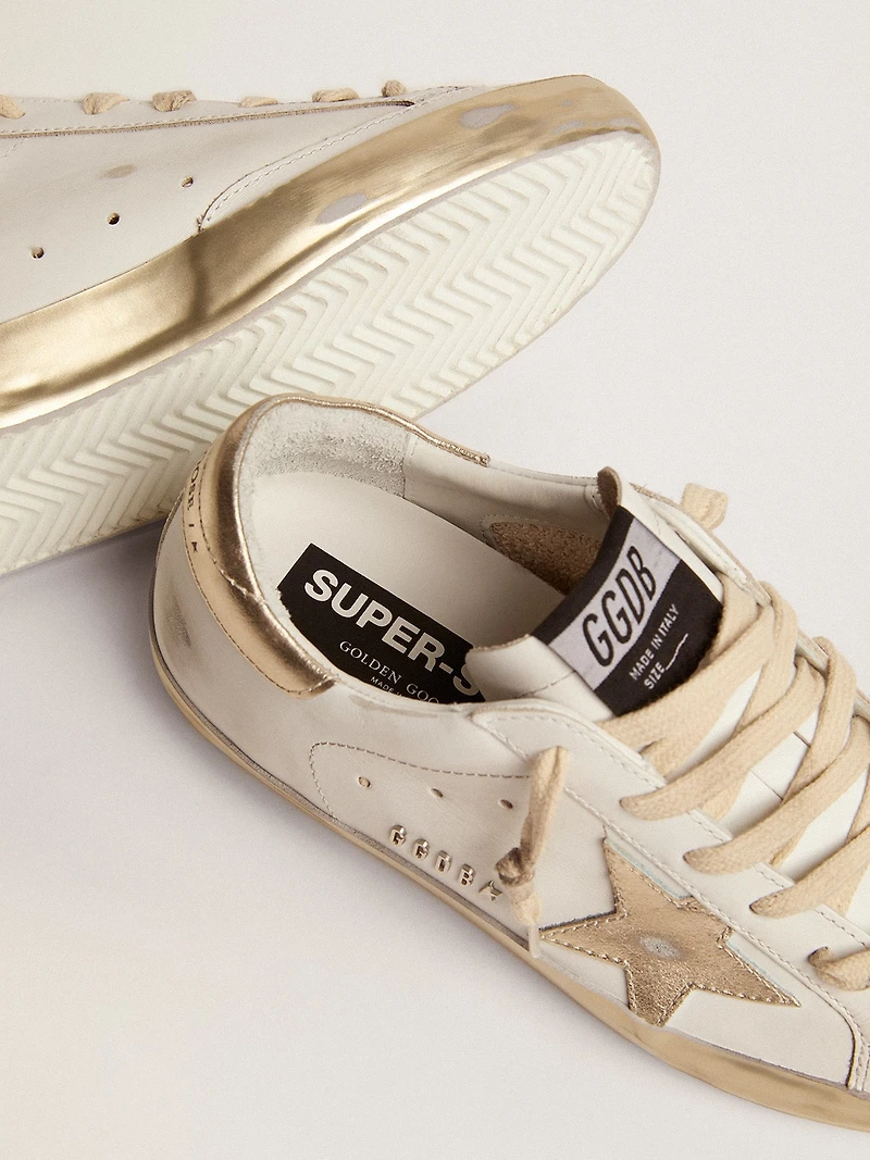 Women's Super-Star with gold sparkle foxing and metal stud lettering