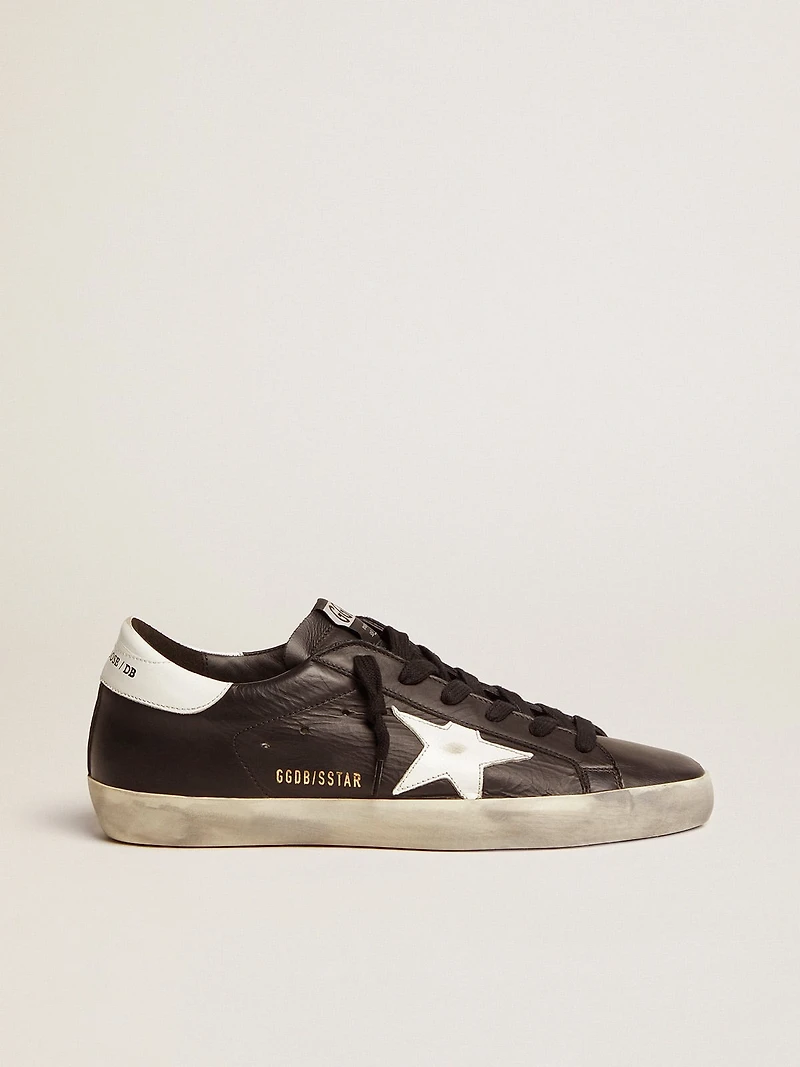 Women’s Super-Star black leather with white star and heel tab