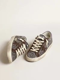 Super-Star glitter with a brown star and lilac heel tab