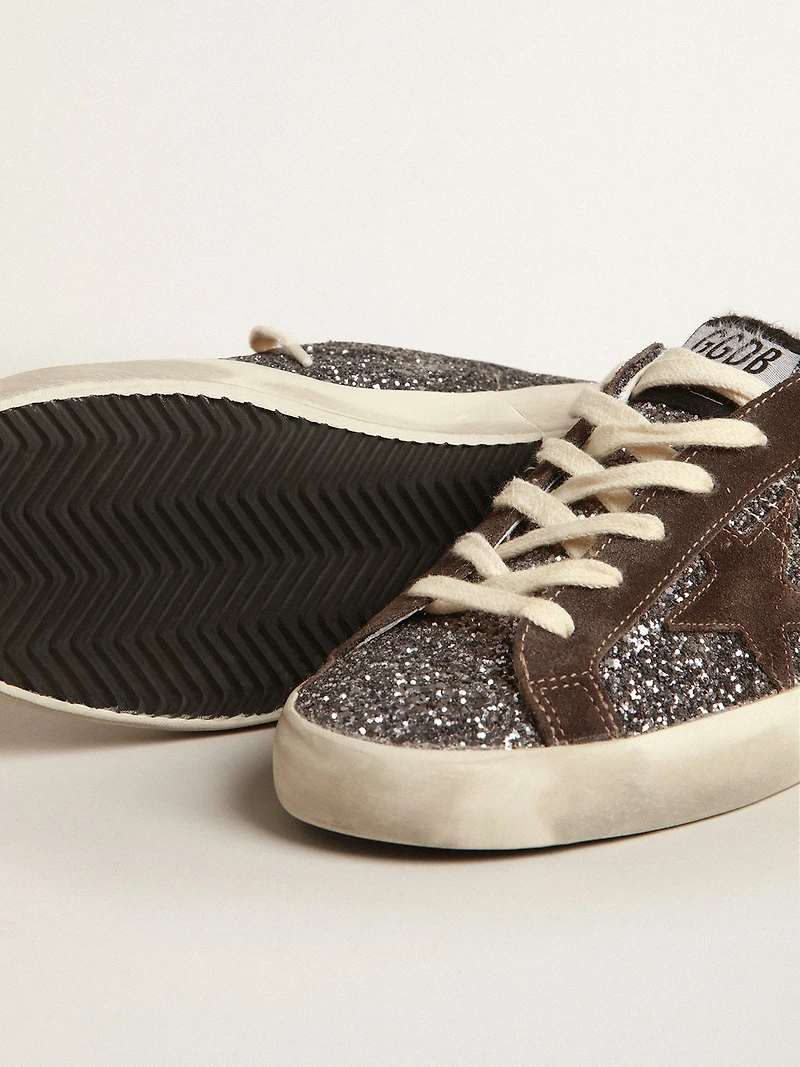 Super-Star glitter with a brown star and lilac heel tab