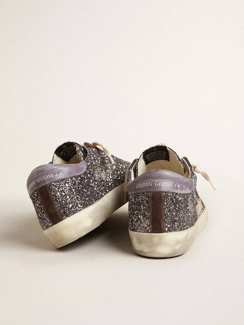 Super-Star glitter with a brown star and lilac heel tab