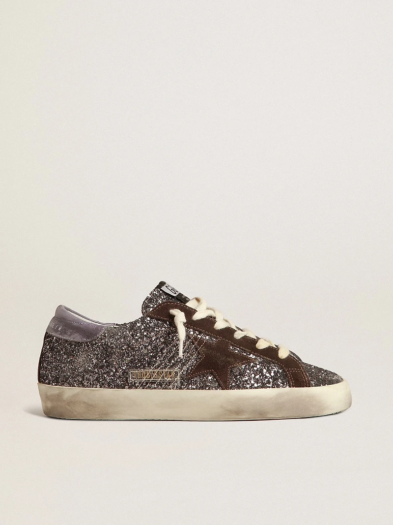Super-Star glitter with a brown star and lilac heel tab