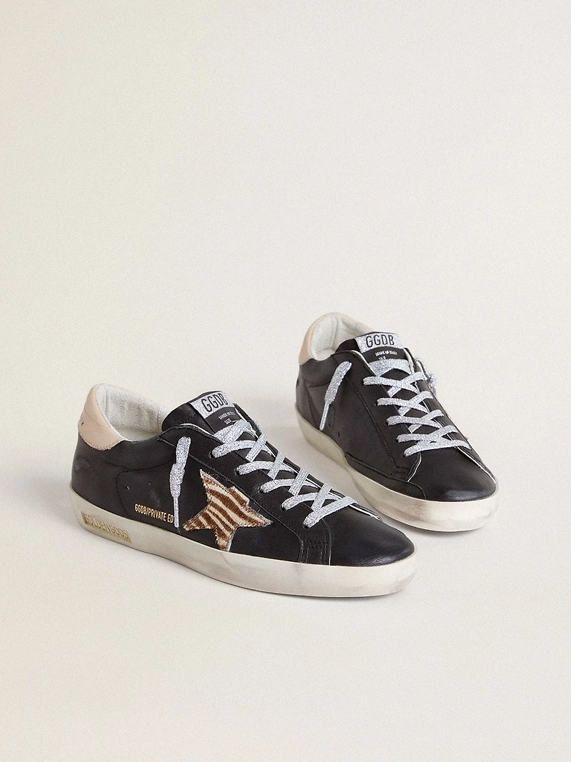Women’s Super-Star black nappa leather with zebra-print pony skin star and beige heel tab