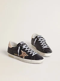 Women’s Super-Star black nappa leather with zebra-print pony skin star and beige heel tab