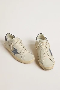 Super-Star LTD with cream-colored leather star Swarovski crystals and blue heel tab lizard print