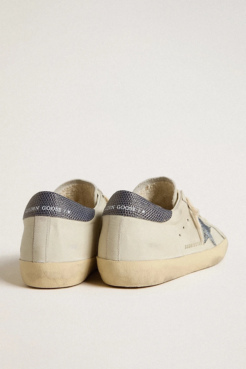 Super-Star LTD with cream-colored leather star Swarovski crystals and blue heel tab lizard print