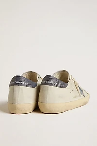 Super-Star LTD with cream-colored leather star Swarovski crystals and blue heel tab lizard print