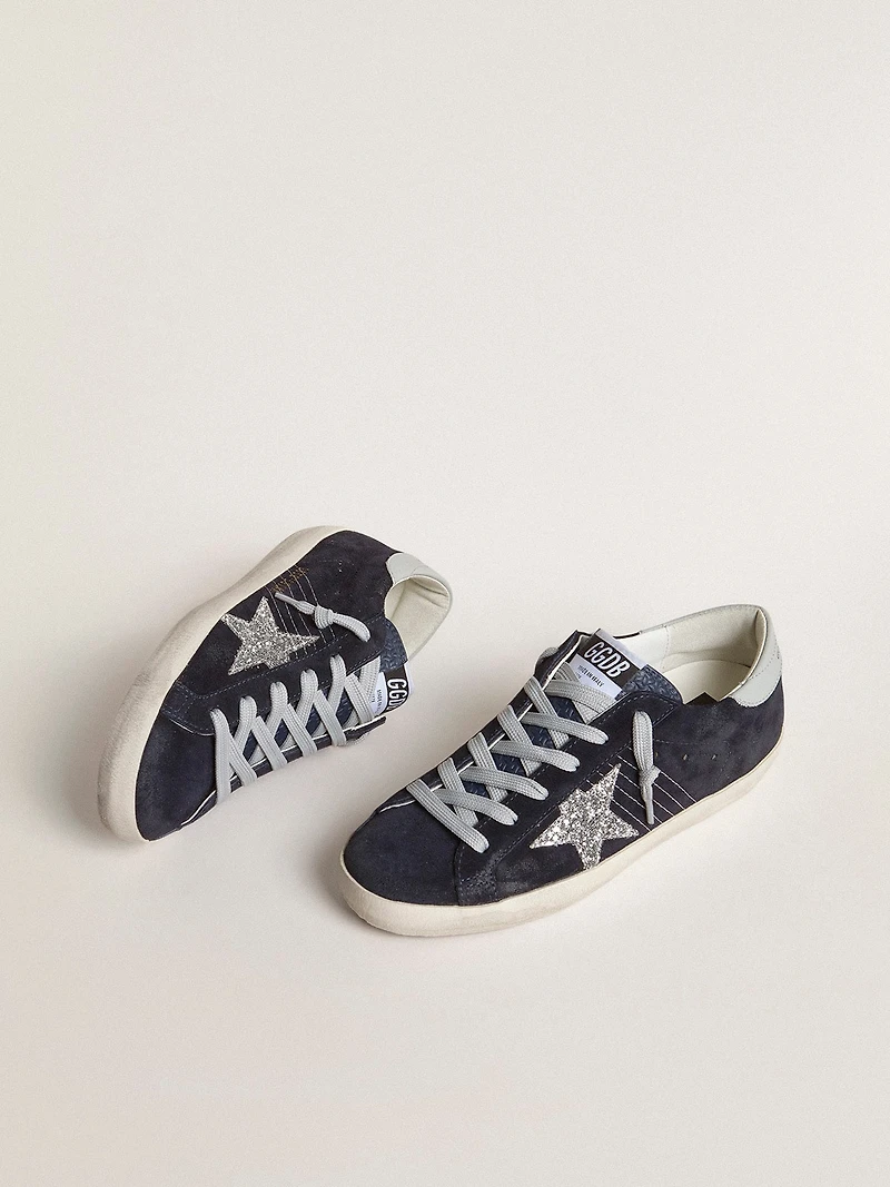 Women’s Super-Star blue suede with silver glitter star and leather heel tab