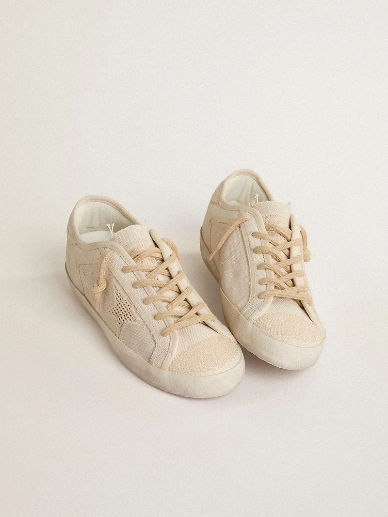 Super-Star pearl-colored canvas with a tone-on-tone mesh effect star