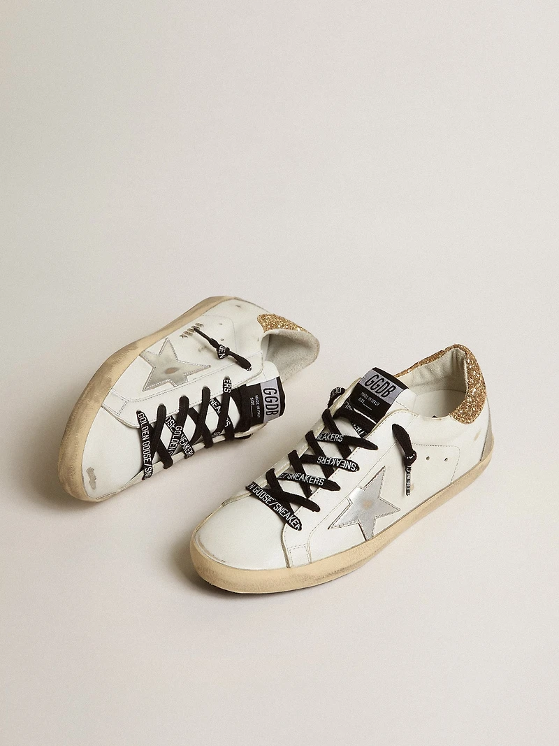 Women's white leather Super-Star with glittery heel tab