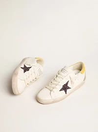 Women’s Bio-based Super-Star with red glitter star and leather heel tab