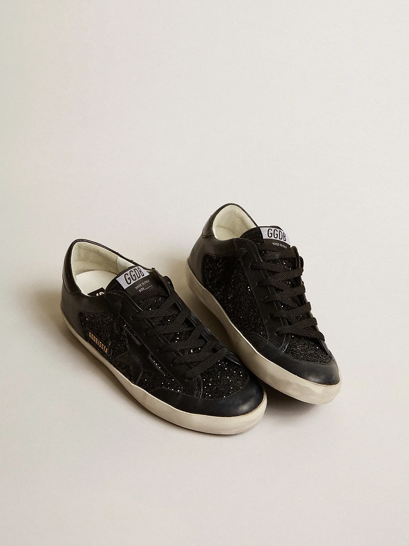 Women's Super-Star in black nappa and glitter with glossy black leather star