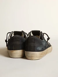 V-Star in midnight-blue denim with black leather star and toe