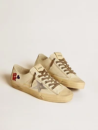 V-Star ecru nappa with silver star and beaded embroidery