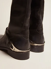 Women's black leather boots with clamp on the heel