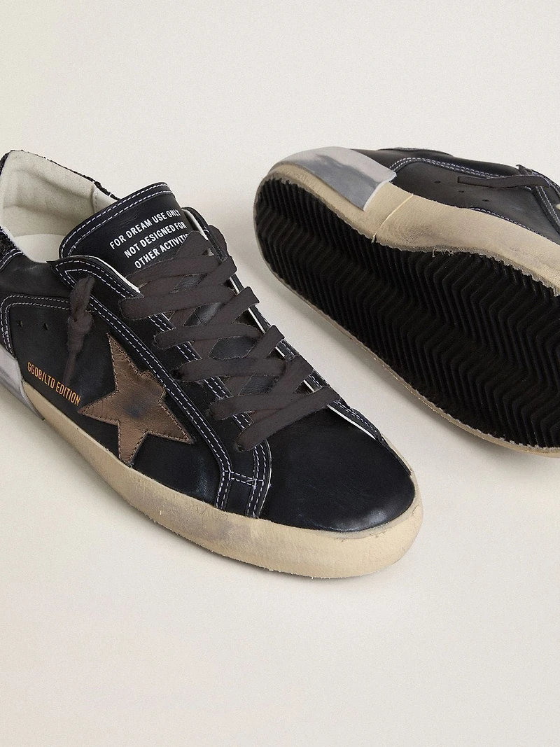 Women's Super-Star LTD black leather with gold star and glitter heel tab