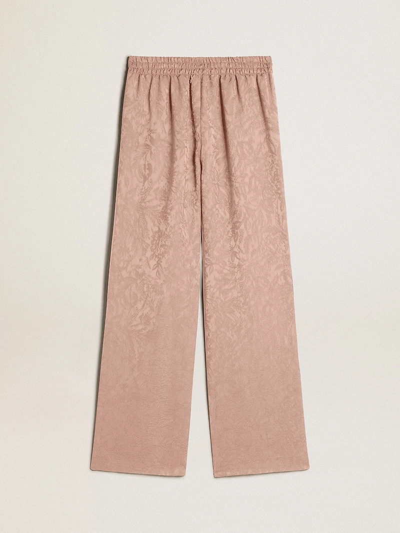 Women's pink viscose pants with floral pattern