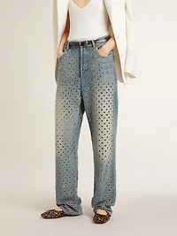 Women's washed jeans with all-over eyelets