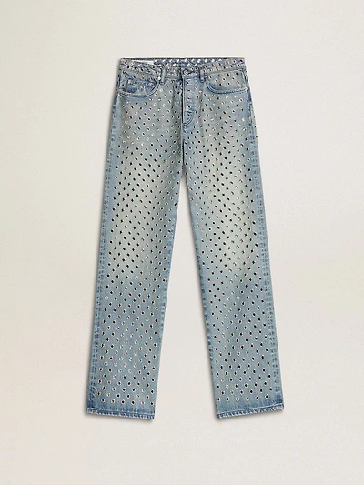 Women's washed jeans with all-over eyelets