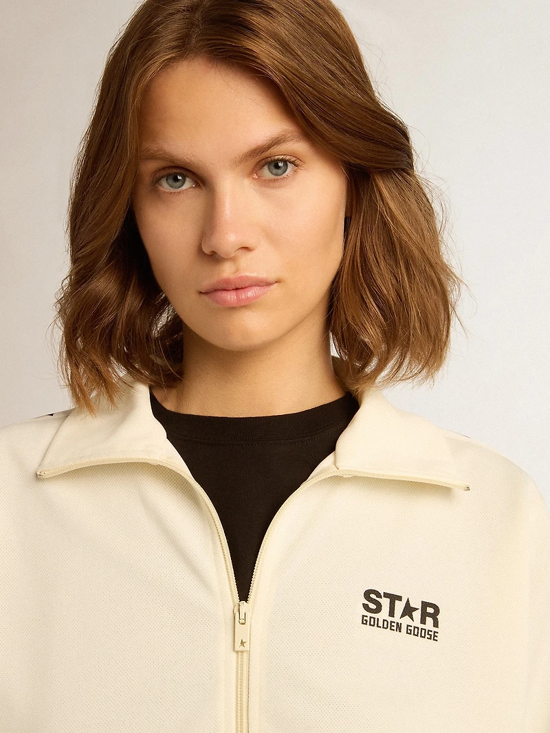 Women’s white zipped sweatshirt with strip and black stars