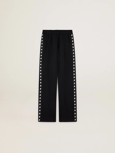 Women’s black joggers with white stars on the sides