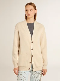 Women’s beige cardigan with 'Golden' lettering on the back