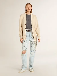 Women’s beige cardigan with 'Golden' lettering on the back
