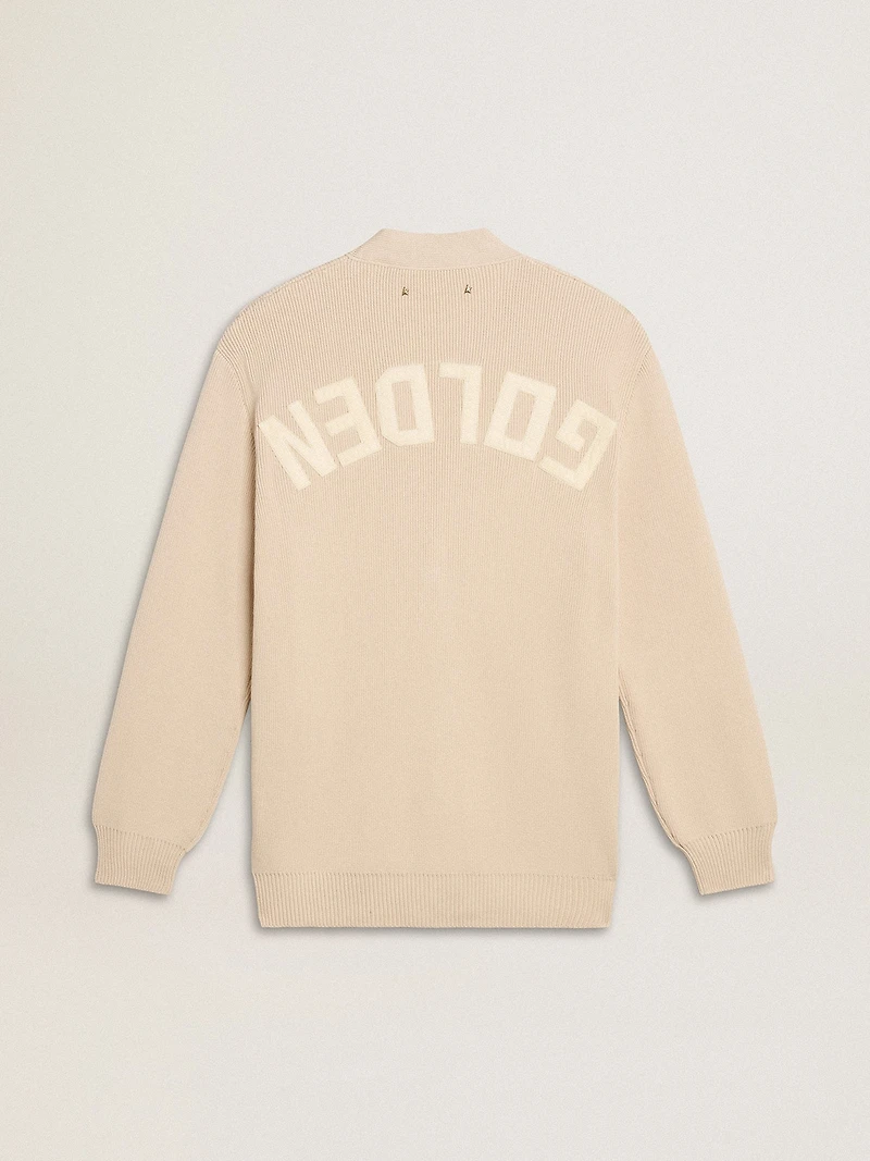 Women’s beige cardigan with 'Golden' lettering on the back