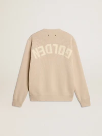 Women's beige sweater with 'Golden' lettering on the back