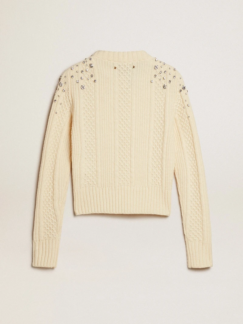 Women's cropped worn-white sweater with decorative crystals