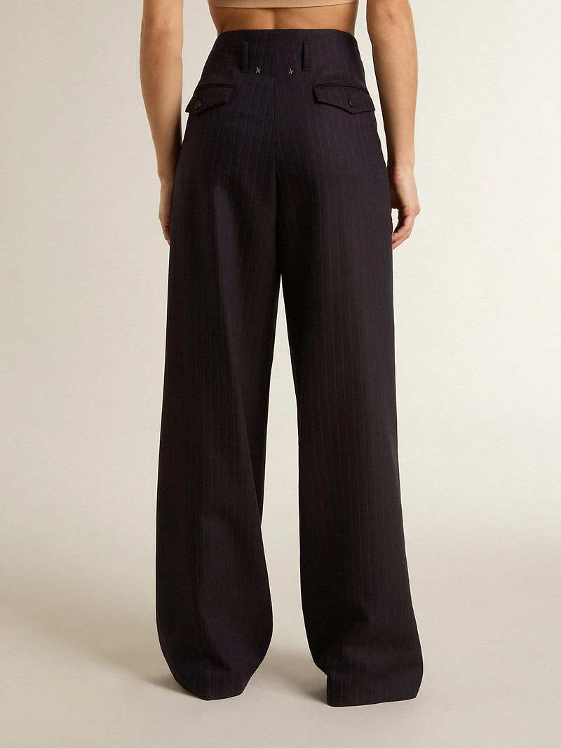 Women’s dark blue tailored trousers with vertical stripe