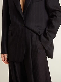 Women’s dark blue tailored trousers with vertical stripe